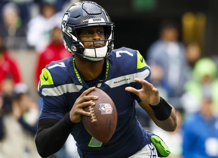 Seattle Seahawks quarterback Geno Smith (7) looks to pass against the New York Jets during the second quarter at Lumen Field.